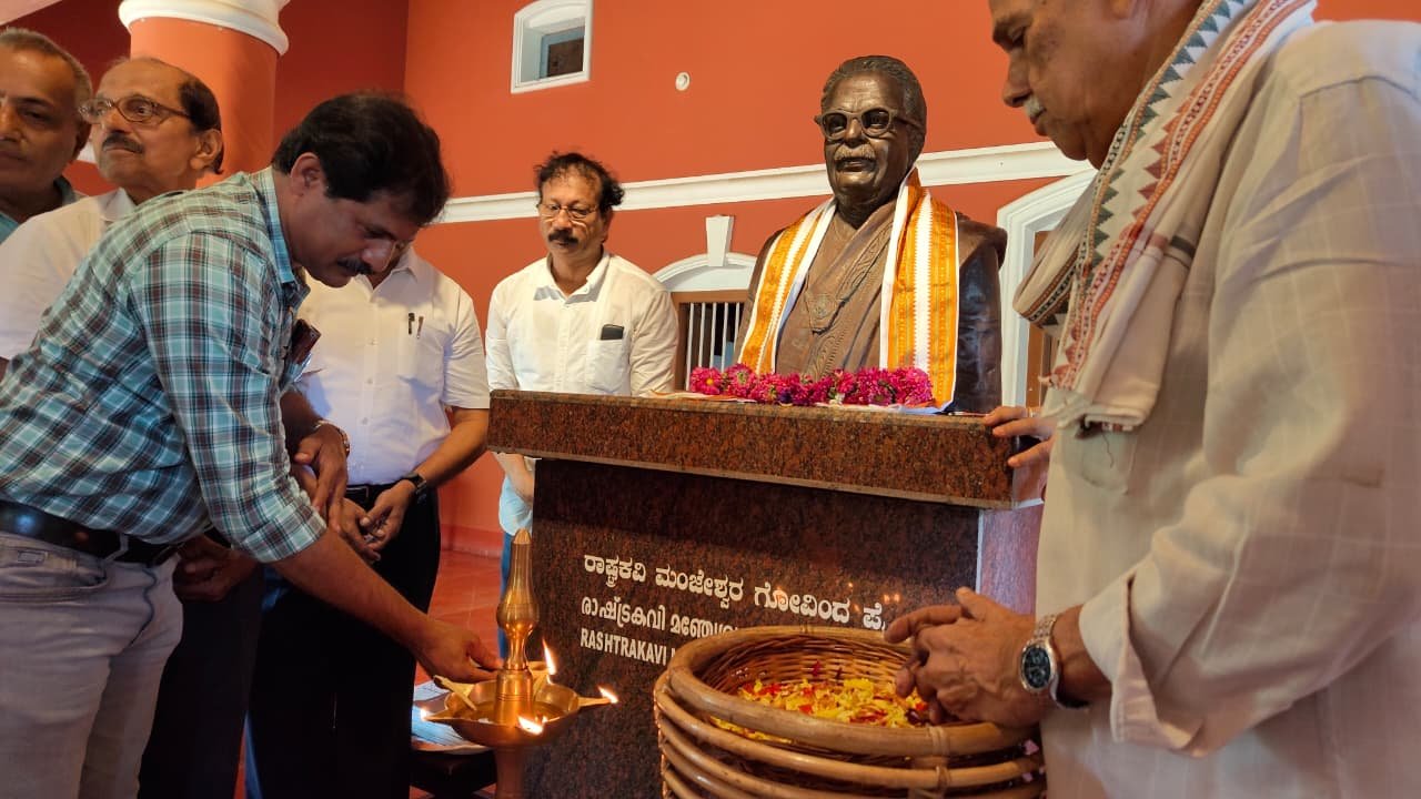 A guest lighting the ceremonial lamp